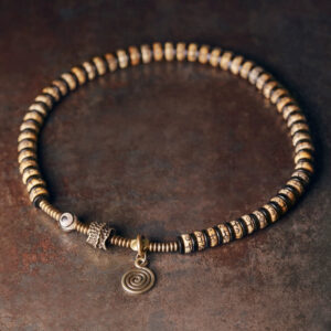Double-Wrap Tibetan-Style Hand-Carved Bone Bead Bracelet with Ebony Spacers, Brass Accents, and Agate Dzi Charm